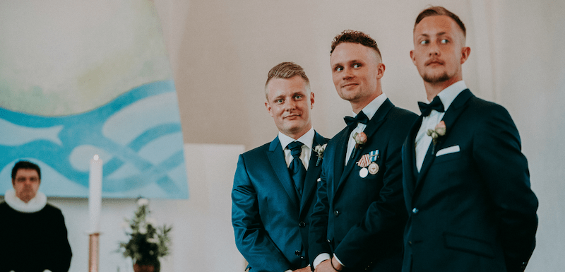 What Does A Best Man Do? 5 Three men in formal wedding attire.