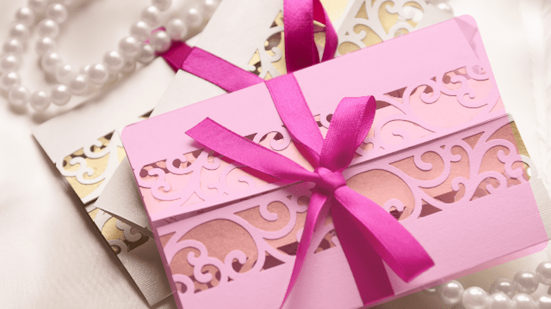 Wedding RSVPs - How to Politely Ask Guests If They're Coming to Your Wedding 3 Elegant pink wedding invitation with ribbon