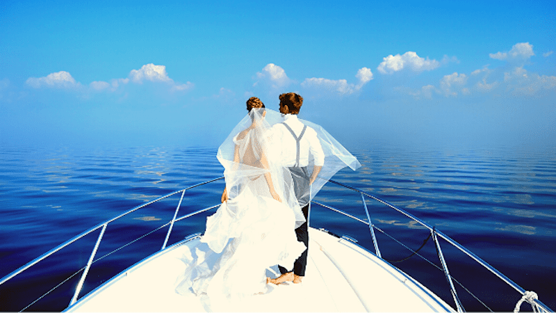 Wedding Advice 12 Couple in wedding attire on boat.