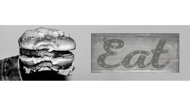 Wedding Vendor Meals: Feed Your Band & Photographer Without Going Crazy 5 Close-up of a hand holding a large burger next to a vintage marquee-style sign that says “Eat.”