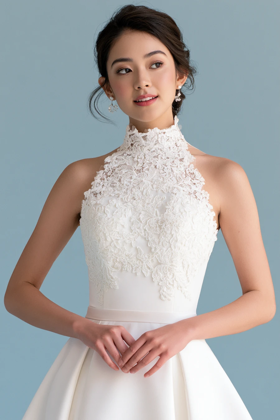 12 Timeless Lace Wedding Dress Styles We Love 11 Bride wearing a high-neck wedding dress with floral lace appliqué bodice, sleeveless silhouette, and elegant modern bridal style
